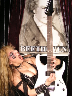 CRUSHER MAGAZINE'S INTERVIEW WITH THE GREAT KAT! "The queen of speed, the champion of all things shred and the uncontested ruler of humanity, a goddess who can play at speeds of 300bpm. The sheer ferocious power of The Great Kats new Beethoven's Guitar Shred DVD has burned all feeble human minds to a cinder in the wake of Kats invincible/truthful shred onslaught. This new bible for humanity has quickly left Kat as the dominant force on the planet Earth." - By Morgan Y. Evans, Crusher Magazine