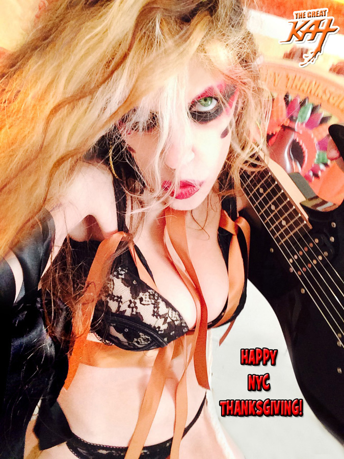 The Great Kat Guitar Shredder declares "HAPPY NYC THANKSGIVING!"