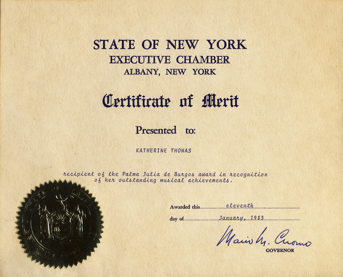 New York Governor Mario Cuomo awarded The Great Kat (Katherine Thomas) the Certificate of Merit as "Recipient of the Palma Julia de Burgos Award in recognition of her outstanding musical achievements".   This certificate has the Seal of the State of New York and Governor Cuomo's signature. Katherine Thomas is the winner of the cultural award "Palma Julia de Burgos Award" from The Association for Puerto Rican - Hispanic Culture, Inc. 