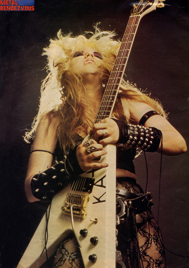METAL RENDEZVOUS MAGAZINE'S INTERVIEW WITH THE GREAT KAT "!!! KAT KRAZY !!!" "HYPERSPEED GUITARIST THE GREAT KAT BURNS HER WAY INTO THE OFFICES OF MRV [Metal Rendezvous]. JOHN STREDNANSKY BECOMES HER FIRST VICTIM."