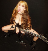 CARMILLA ON LINE FEATURES THE GREAT KAT IN "TOO MANY NOTES. WICKED, INCOMPLETE AND BIASED HISTORY OF SHRED GUITAR"! "One is surprised to discover that there exists a human that fast, which is a furious woman. She is called The Great Kat, always dressed like a dominatrix and covered in blood of her enemies. Costumed in this way, there is a madness that borders on genius. The Great Kat has decided to convert the immortal themes of Paganini, Vivaldi, Beethoven and Wagner, which she calls 'shred/classical', where the scores are a hail of bullets."  - Filippo Casaccia, Carmilla On Line (Italy)