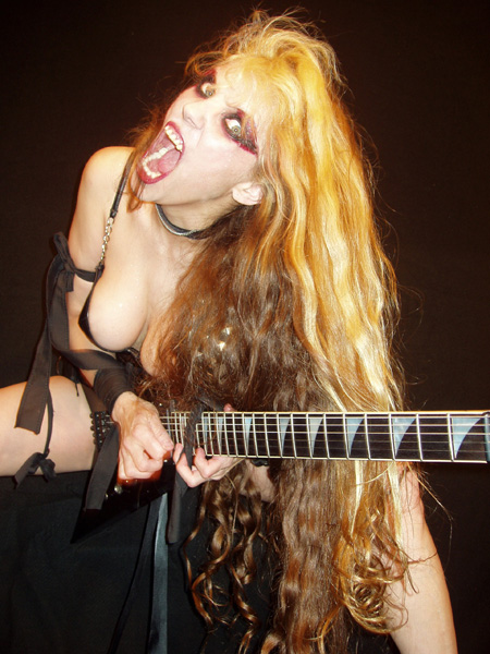 NONELOUDER FEATURES "BEETHOVEN'S GUITAR SHRED" DVD! "She doesn't play, but incinerates, classical music -- and is faster than Yngwie Malmsteen. The Great Kat - a Juilliard graduate, takes guitar playing, classical music, and performance wow-ness to a whole new level." - Melanie "Sass" Falina, Nonelouder