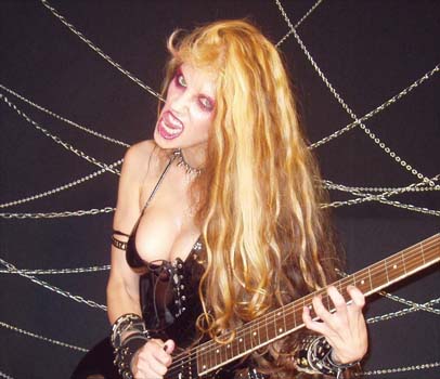 GUITAR PLAYER MAGAZINE BRAZIL NEWS on THE GREAT KAT! "The Great Kat: Shred Guitar Tablature. The guitar virtuoso, The Great Kat, will soon launch the tablatures of the masterpieces of the erudite music that she interprets in her CDs (among others, composition of Paganini, Bach, Beethoven and Vivaldi). Kat is always listed among the ten fastest guitarists of the world and is known by her shred style of guitar ("fritao" of guitar). More information on the official site http://www.greatkat.com " - Henrique Inglez de Souza, Guitar Player Magazine Brazil 