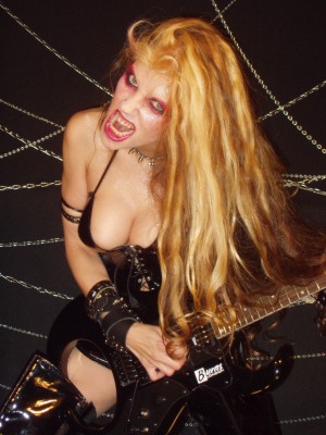 GOTHLAW FEATURES THE GREAT KAT! "Breath-taking rendition of 'Flight of the Bumblebee' which topped out at near 400 bpm. Insane fast that is... Also, she's insane, megalomaniacal, great big hair, and has a killer body." - Der Schatten, Gothlaw 
