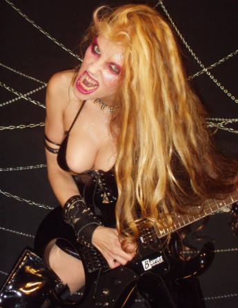 THE GREAT KAT IN EXCITE.COM's "ENTERTAINMENT - THE BUZZ LIST 2005 IN REVIEW- A Bizarre Look Back at 2005" By Patrick Holland, Excite.com "Ladies and gentlemen... the Great Kat. (Somehow, I managed to escape the interview unharmed.)"
